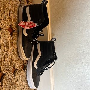 BRAND NEW VANS! Black leather. Size 8.5